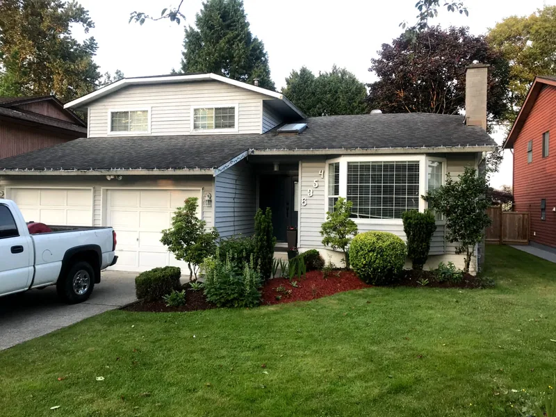 A finished landscaping project by Surrey King Construction - a manicured front yard in the BC Lower Mainland.